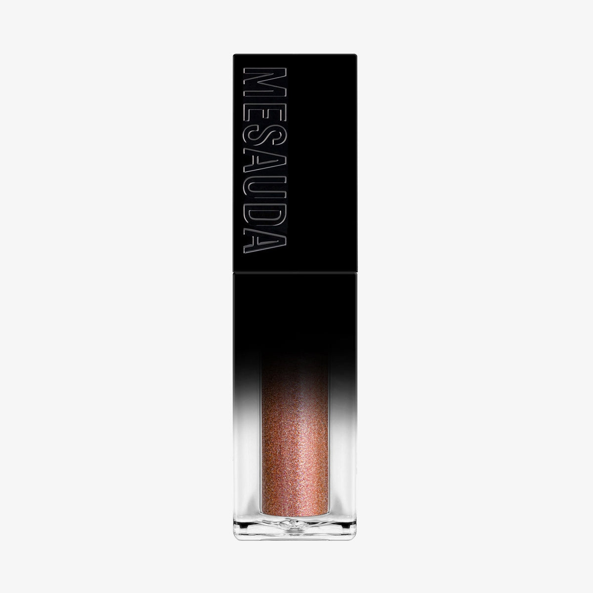 Der Galactic Shadow Flüssigliedschatten von Mesauda Beauty in einer rechteckigen Tube mit dem Mesauda-Label auf einer schwarzen Kappe.
