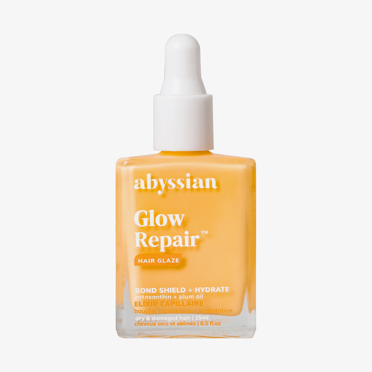 Abyssian Glow Repair Hair Glaze mit Tropfer, orangefarbene Flüssigkeit für trockenes, strapaziertes Haar.