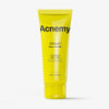 Eine gelbe Tube Acnemy Zitmask (100 ml) vor weißem Hintergrund