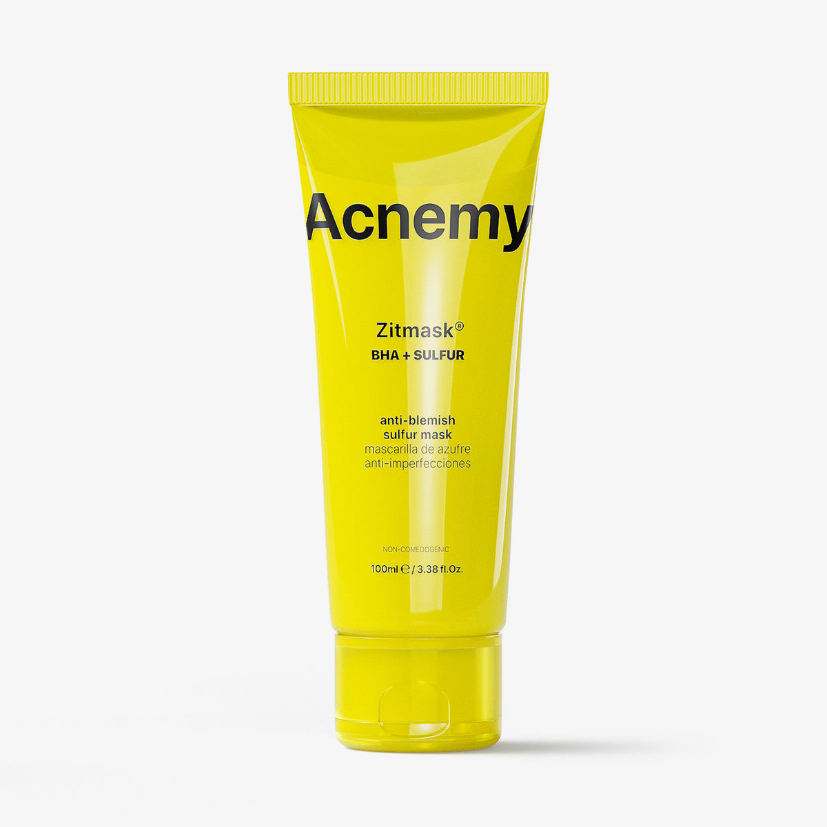 Eine gelbe Tube Acnemy Zitmask (100 ml) vor weißem Hintergrund