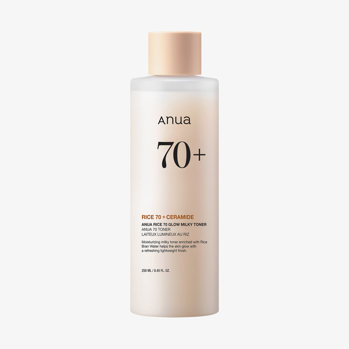 Auf weißem Hintergrund ist eine beige Flasche Rice 70 Glow Milky Toner, 250 ml mit Ceramid, abgebildet.