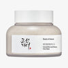 Mattierter transparenter Tiegel Ground Rice and Honey Glow Mask mit weißem Deckel vor weißem Hintergrund.