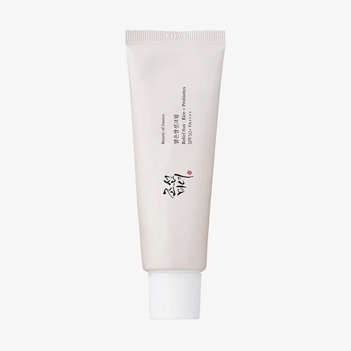 Weiße Tube der Relief Sun: Rice + Probiotics von Beauty f Joseon vor weißem Hintergrund