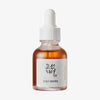 Transparente Tropfflasche mit braunem Beauty of Joseon Revive Eye Serum Ginseng+Snail Mucin vor weißem Hintergrund