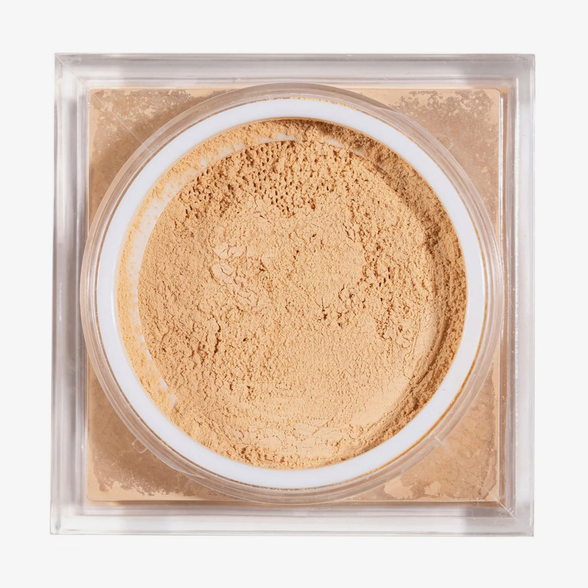 Offener quadratischer Behälters mit beigem losem Puder BPerfect Cosmetics x Katie Daley Perfect Powders Honeycomb.