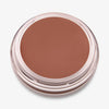 Runder Behälter mit durchsichtigem Deckel von Cronzer – Cream Bronzer.