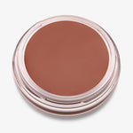 Ein runder offener Behälter mit Cronzer Cream Bronzer Toasted mit braunem Inhalt auf weißem Hintergrund.