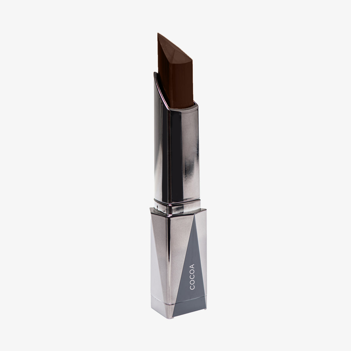Shapestick Bronze & Define Cocoa in einem dunkelbraunem Ton in dreieckigem silbernem Drehgehäuse vor weißem Hintergrund.
