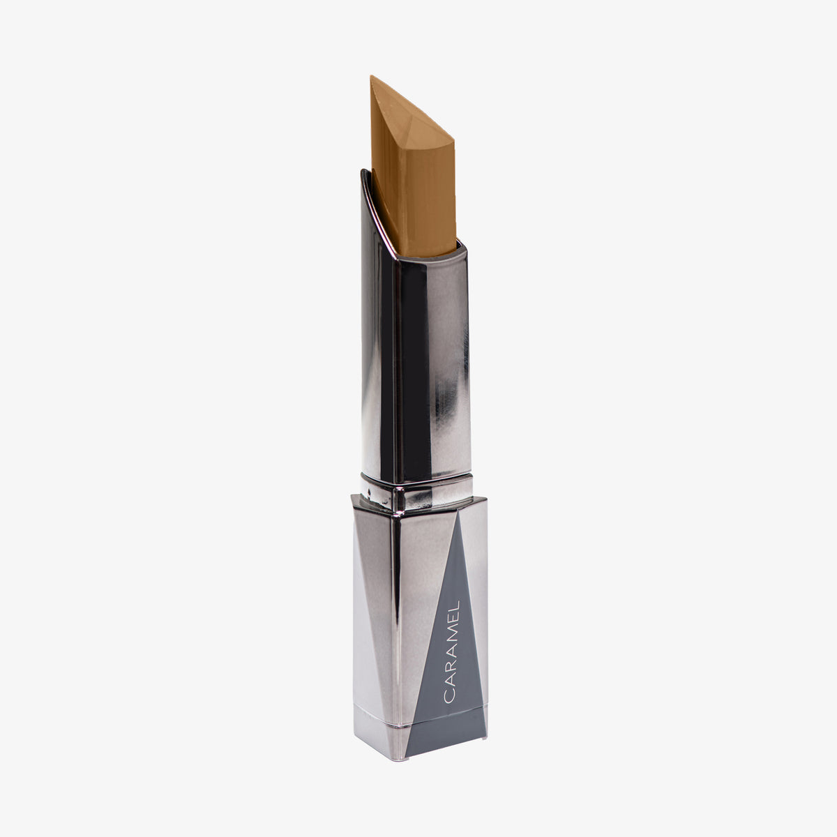 Shapestick Bronze & Define Caramel in einem Karamell-Ton in dreieckigem silbernem Drehgehäuse vor weißem Hintergrund.