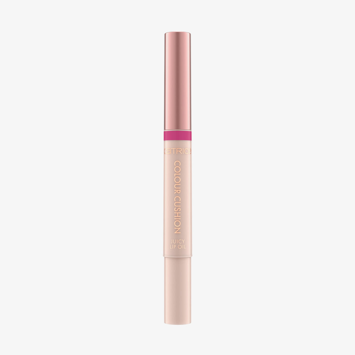 Eine roségoldene und rosafarbene Tube von Catrice Cosmetics Colour Cushion Juicy Lip Oil ist auf einem weißen Hintergrund abgebildet.