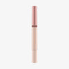 Schlanke Tube des Catrice Colour Cushion Juicy Lip Oils in Rosé-Gold und Nude, elegant und minimalistisch vor weißem Hintergrund.