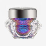 Transparenter Tiegel Infinite Chrome Flakes Bi-Pride mit bunt schillerndem Inhalt und silbernem Deckel vor weißem Hintergrund.