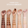 Fünf Arme unterschiedlicher Hauttypen präsentieren Farbmuster der Yummy Skin Lift & Flex Concealer von Danessa Myricks Beauty.
