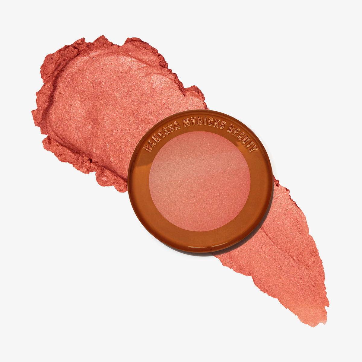 Yummy Skin Blurring Balm Powder Lowlighter Lowkey mit cremigem schimmerndem pfirsichfarbenem Swatch auf weißem Hintergrund.