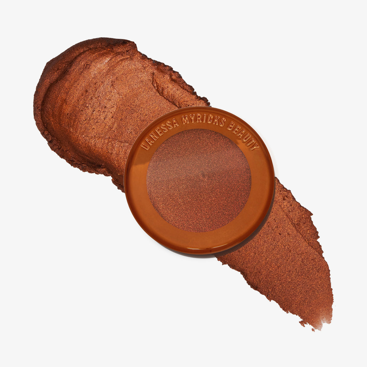 Yummy Skin Blurring Balm Powder Lowlighter Off The Grid mit cremigem bronze schimmerndem Swatch auf weißem Hintergrund.