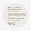 Weißer runder Behälter Crop Strutters Construction Cream mit humorvollem Produkttect auf dem Deckel.