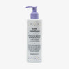 Weiße Flasche Fabuloso Platinum Blonde Toning Shampoo mit violetter Pumpe und bunten Punkten auf dem Etikett.