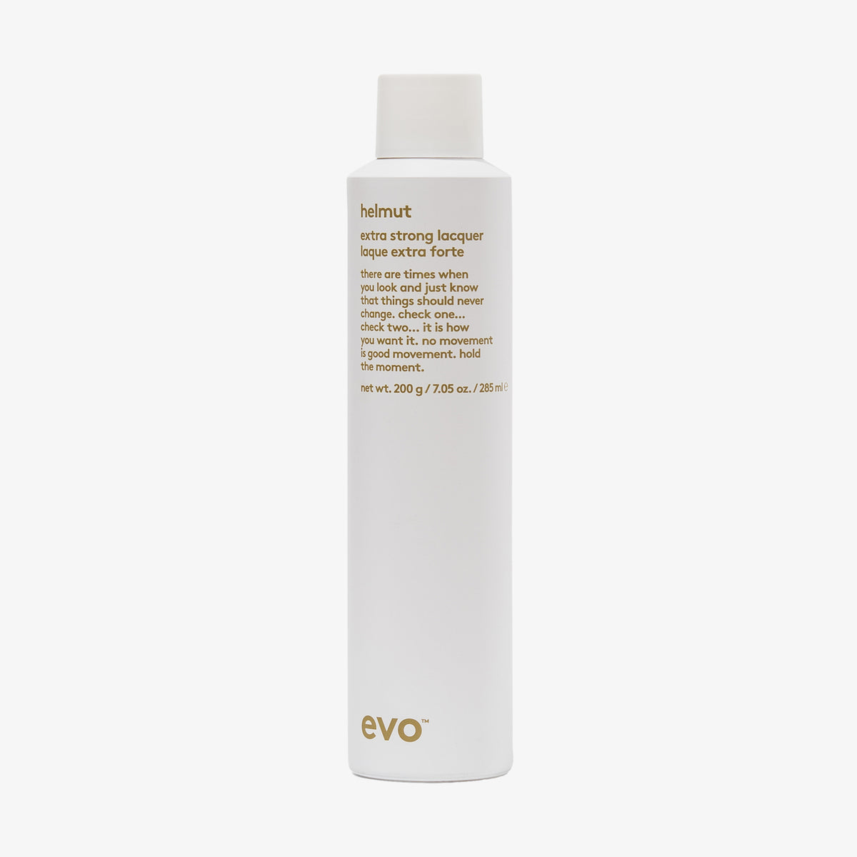 Weiße Flasche Helmut Extra Strong Lacquer Haarspray mit humorvollem Produkttext auf schlichtem Hintergrund.