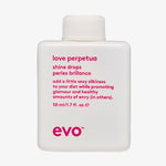 Weiße Flasche Love Perpetua Shine Drops mit humorvollem Produkttext vor weißem Hintergrund.