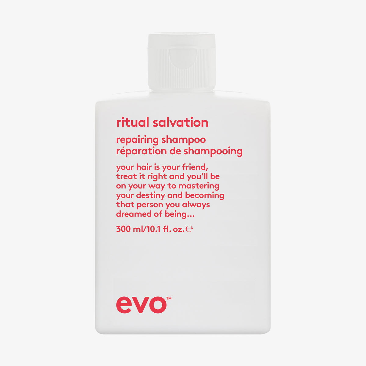 Weiße Flasche Ritual Salvation Repairing Shampoo mit humorvollem Produkttext vor weißem Hintergrund.