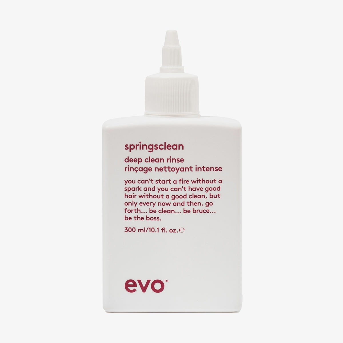 Weiße Flasche Springsclean Deep Clean Rinse mit humorvollen Produkttext und spitzer Düsenkappe.