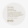 Weißer runder Behälter der The Shag Beach Paste von evo mit humorvollem Produkttext auf dem Deckel.