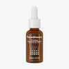 Braunes Glasfläschchen Facetheory CeraNight Rejuvenating Night Oil mit weißer Pipette, Beschriftung in Weiß, 30 ml.