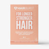 Pfirsichfarbene Schachtel des Shampoo & Conditioner for Dry and Damaged Hair vor weißem Hintergrund.