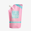 Rosa Nachfüllbeutel „Hairburst For Longer Stronger Hair“ Conditioner, 350 ml, mit Schraubverschluss auf weißem Hintergrund.