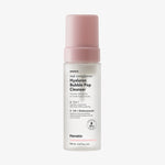 Matt-transparente Flasche Real Complexion Hyaluron Bubble Pop Cleanser von Hanskin mit rosa Deckel vor weißem Hintergrund.