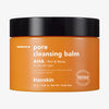 Orangener Tiegel Hanskin Pore Cleansing Balm AHA mit schwarzem Deckel vor weißem Hintergrund.