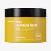 Gelber Tiegel Hanskin Pore Cleansing Balm PHA mit schwarzem Deckel vor weißem Hintergrund.