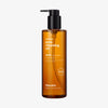 Bernsteinfarbene Flasche Pore Cleansing Oil AHA von Hanskin mit schwarzer Pumpe auf weißem Hintergrund.