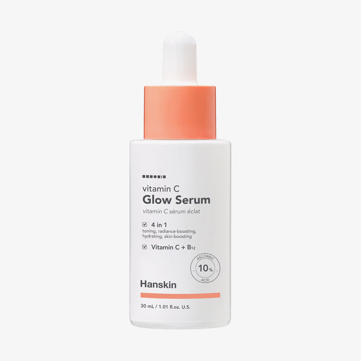 Weiße Tropfflasche Hanskin Vitamin C Glow Serum mit pfirsischfarbenen Akzenten vor weißem Hintergrund.