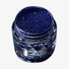 Offener transparenter Tiegel des Glitter Pot Sapphire Gem mit lila schimmerndem Glitzer auf weißem Hintergrund.
