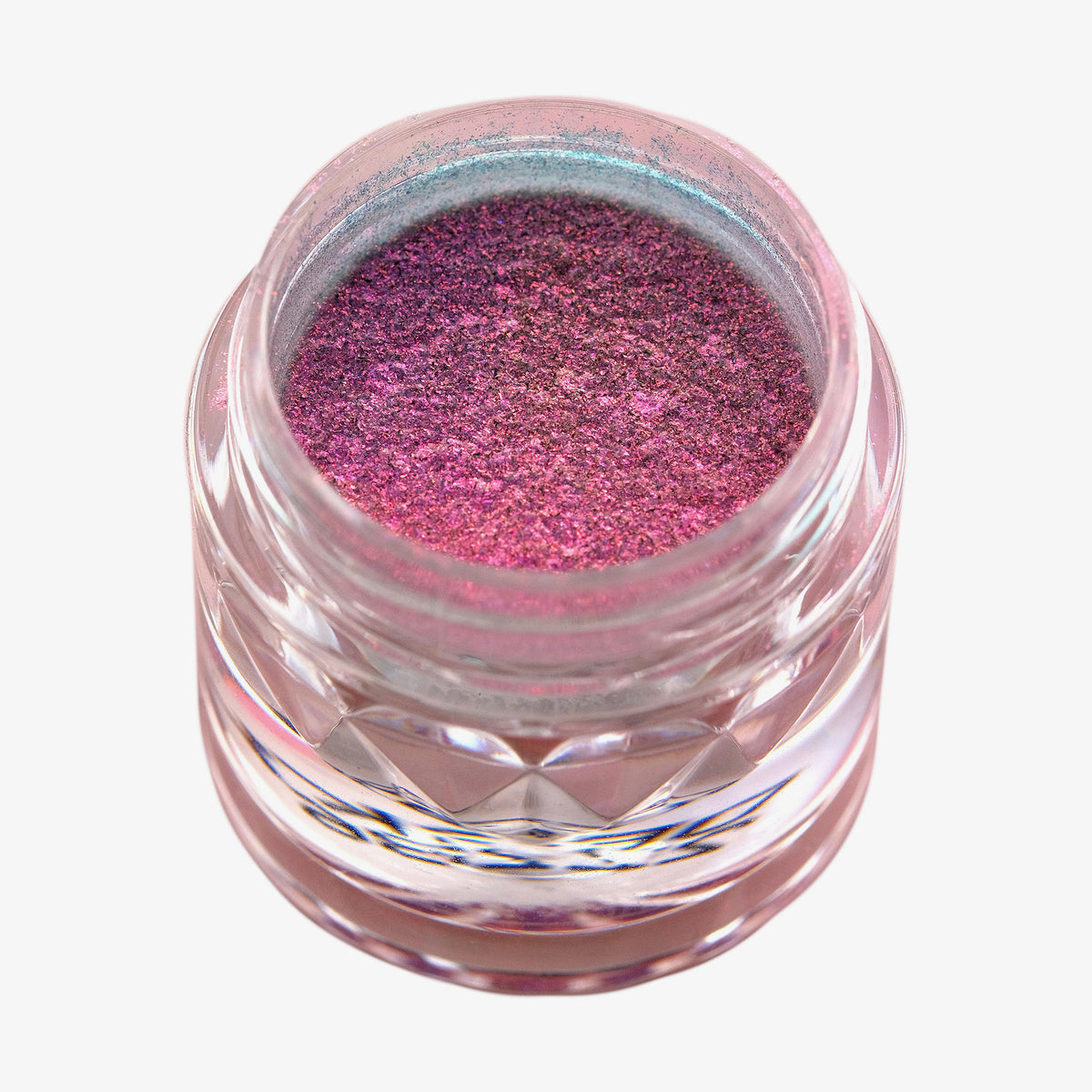 Offener transparenter Tiegel des Opal Multichrome Loose Eyeshadow Skylight mit rosa-blau schimmerndem Glitzer auf weißem Hintergrund.