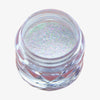 Offener transparenter Tiegel des Opal Multichrome Loose Eyeshadow Velvet Dreams mit blau-weiß-opal schimmerndem Glitzer auf weißem Hintergrund.
