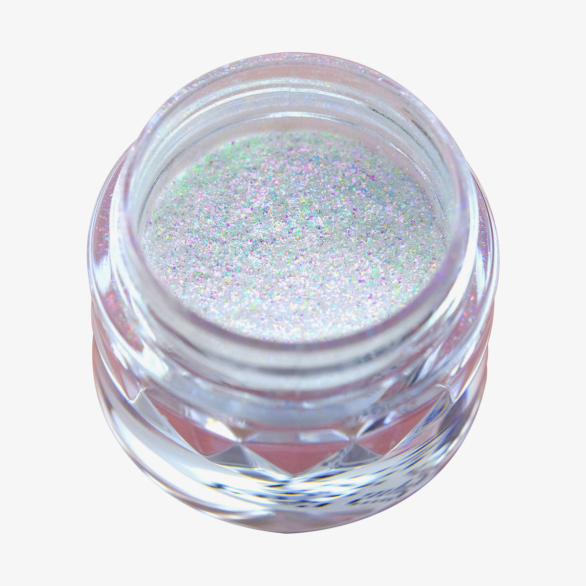 Offener transparenter Tiegel des Opal Multichrome Loose Eyeshadow Velvet Dreams mit blau-weiß-opal schimmerndem Glitzer auf weißem Hintergrund.