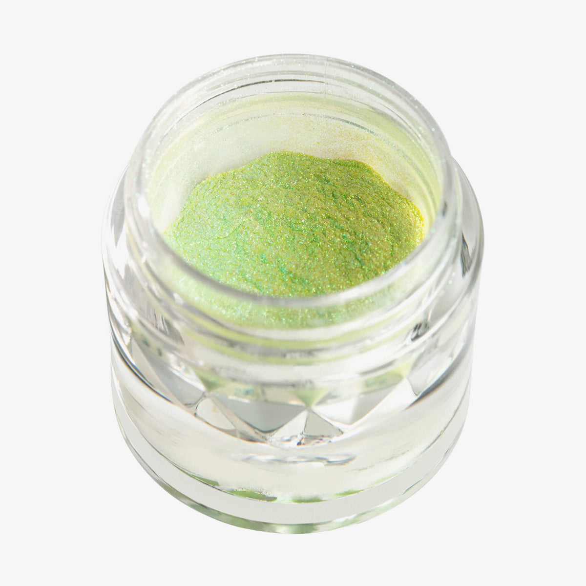 Offener transparenter Tiegel des Pastel Duochromes Loose Eyeshadow Pom Pom mit heller neongrün schimmernder Textur auf weißem Hintergrund.