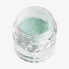Offener transparenter Tiegel des Pastel Duochromes Loose Eyeshadow Tutu mit mintgrün schimmernder Textur auf weißem Hintergrund.