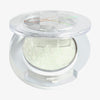 Offene transparente Kompaktdose des Pressed Opal Multichrome Eyeshadow Nightfall mit gelb-weiß schimmerndem gepressten Lidschatten auf weißem Hintergrund.
