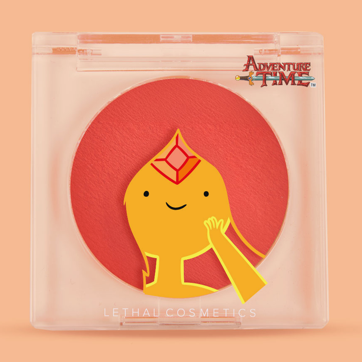 Transparente Kompaktdose des Lethal Cosmetics Adventure Time Blush Flame Princess mit orangerotem Inhalt und Abbildung der Flame Princess.