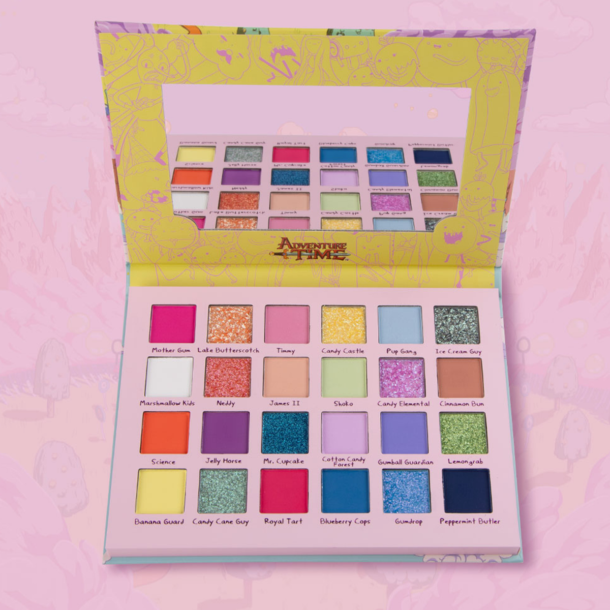 Öffne die „Adventure Time Candy Kingdom“-Palette von Lethal Cosmetics mit 20 farbenfrohen Farbtönen und einem Spiegel im Deckel.