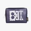 Die lilane Spongbob Movie Skull & Bones MakeUp Bag von Lethal Cosmetics mit einem weißen Totenkopf, einem goldenen Reißverschluss und einem kleinen schwarzen Etikett.