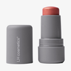 Graue Tube von LH Cosmetics Artistick Blush in Modern, Kappe abgenommen, um den Korallenton zu zeigen.