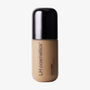 Eine beigefarbene Flasche der „Ctrl+ SKIN“-Foundation von LH Cosmetics mit schwarzem Verschluss.