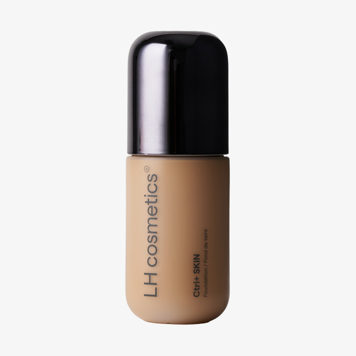 Auf einem schlichten weißen Hintergrund ist eine beigefarbene Flasche der Foundation „Ctrl+ SKIN“ von LH Cosmetics mit schwarzem Verschluss abgebildet.