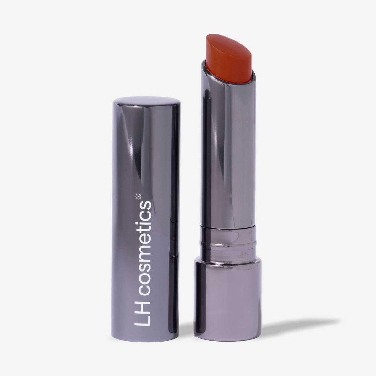 Dunkler silberner Drehstift des Fantastick Lipstick Poppy von LH Cosmetics mit  rostrotem Lippenstift auf weißem Hintergrund.