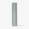 Eine graue Flasche „LH Cosmetics On Set – Subtle Glow Setting Spray“ wird vor einem weißen Hintergrund präsentiert.