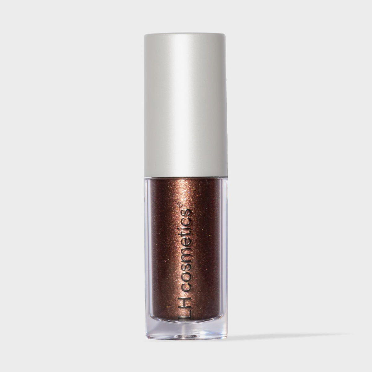 Transparente Tube Sparkl von LH Cosmetics mit weißer Kappe und braun-bronze schimmerndem Farbton namens Glitz.